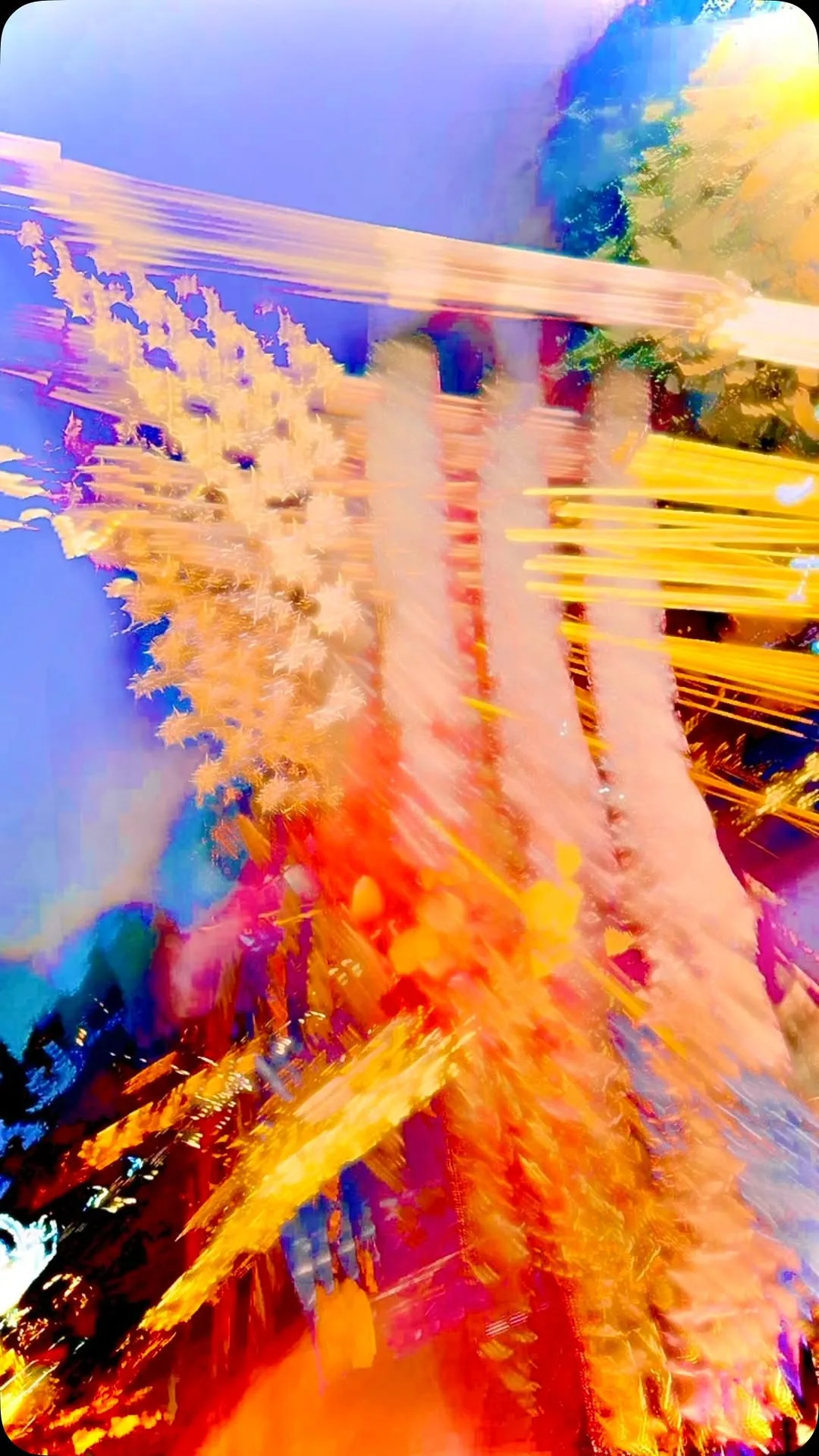 Abstract firework study in blue, gold, and red